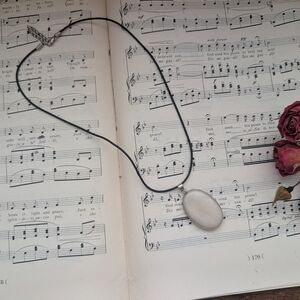 Elegant Black Necklace with White Pendant